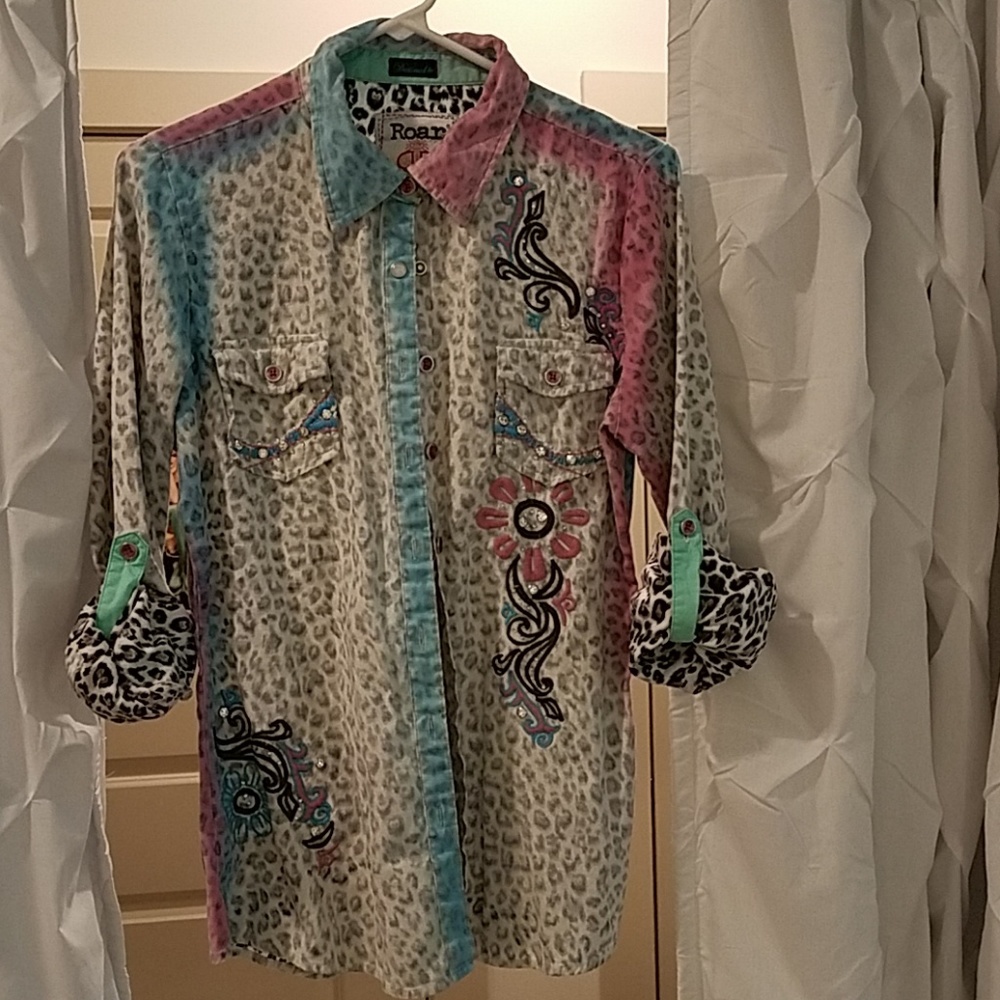 Roat shirt with crystal embellishments.